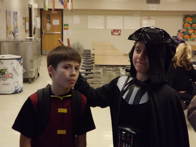 Zack and his best friend on and off-ice ham it up at school trick-or-treat
